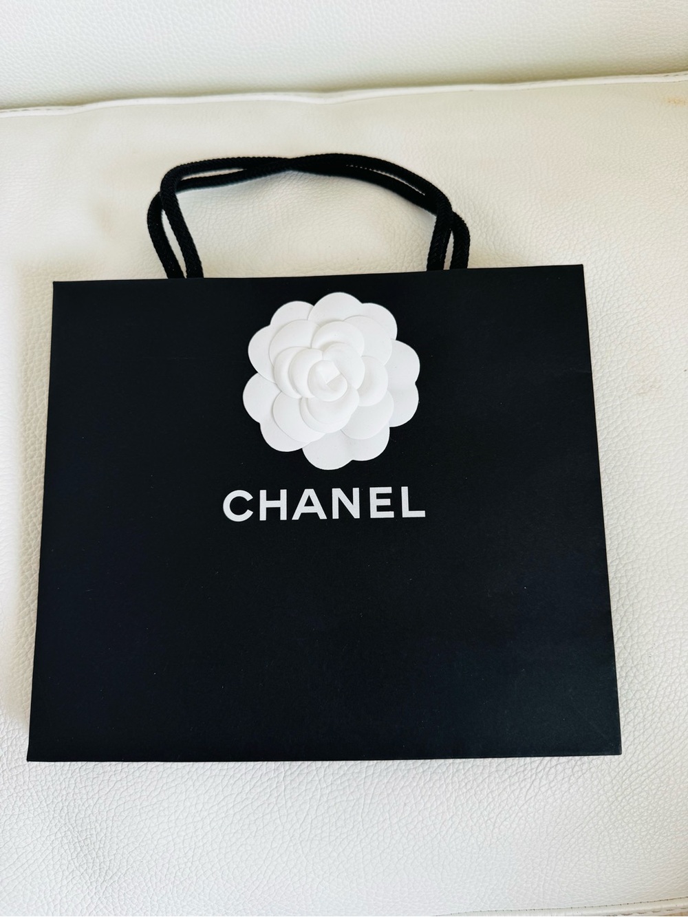 Authentic CHANEL Black Shopping Bag with White Camellia